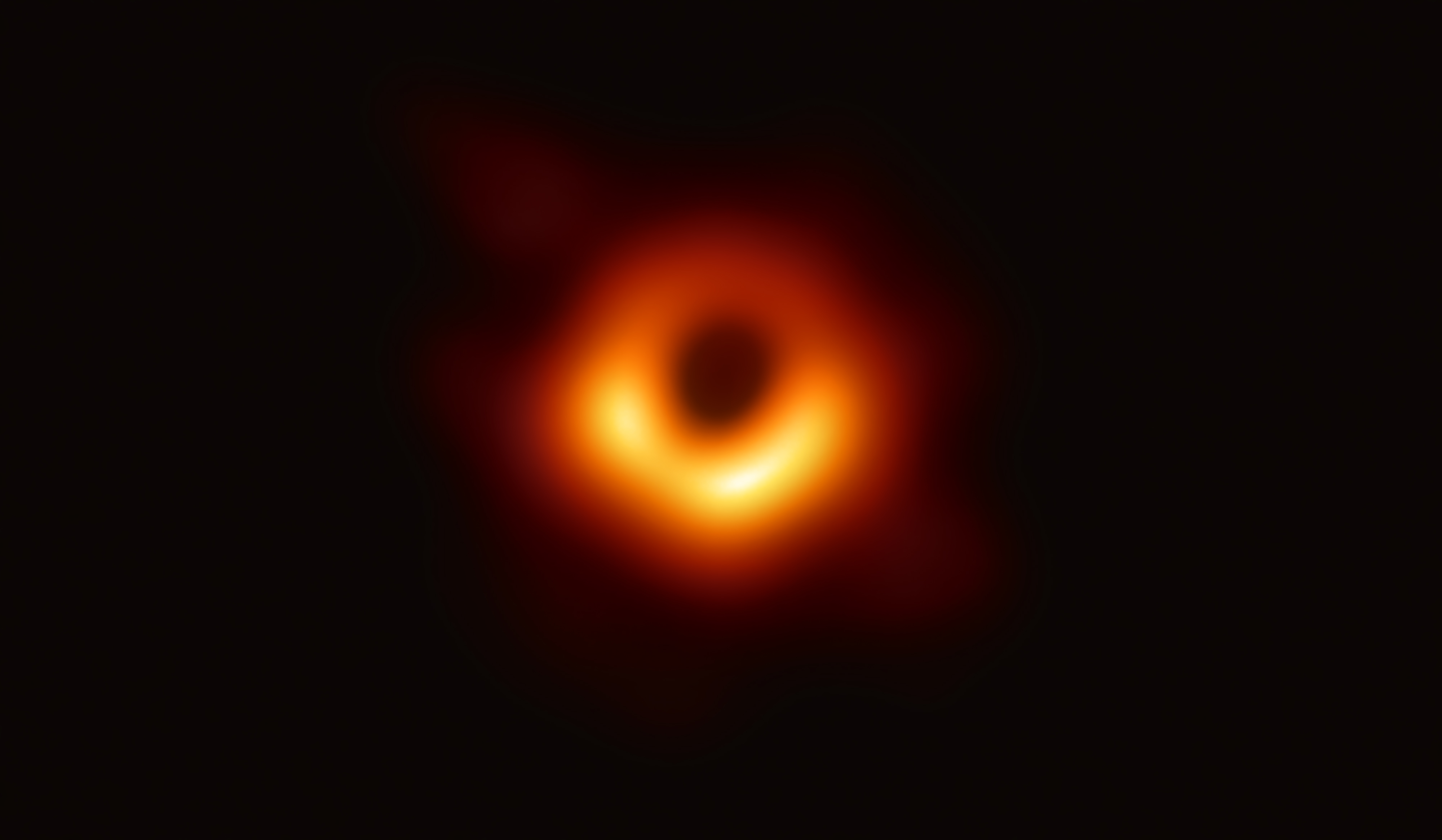 First direct image of a black hole — M87 captured by the Event Horizon Telescope in 2019 showing the bright ring and dark shadow
