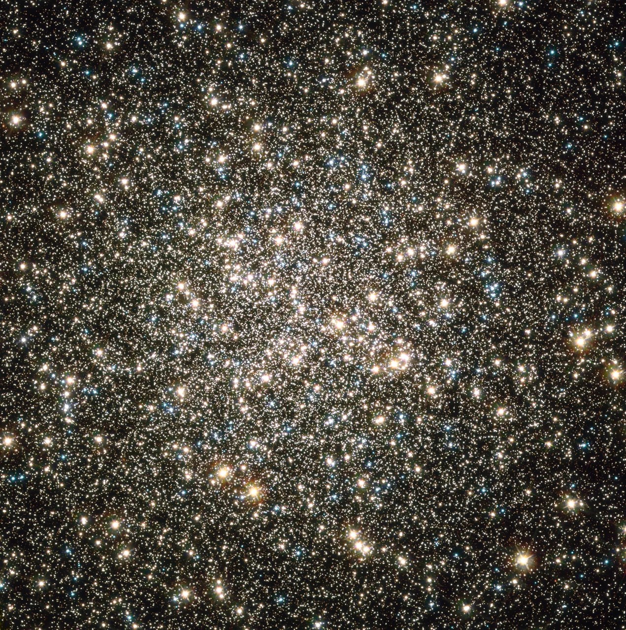 The M13 Hercules Globular Cluster as captured by the Hubble Space Telescope — hundreds of thousands of stars packed into a dense sphere 25,000 light-years away
