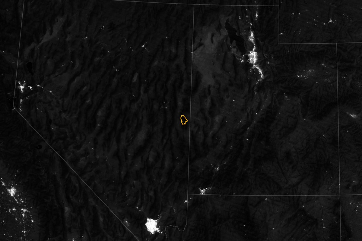NASA Earth Observatory night-lights image of Nevada and Utah with Great Basin National Park outlined, Las Vegas glowing at the bottom left