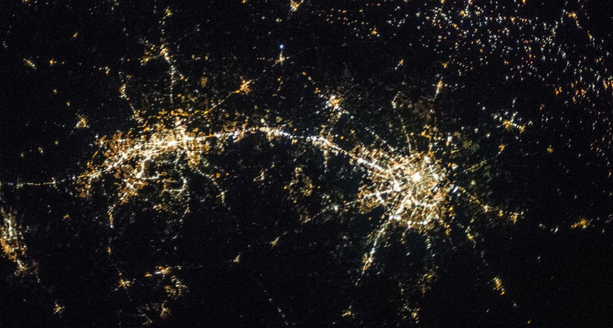 San Antonio and Austin at night from the International Space Station, joined by the lit Interstate 35 corridor with dark Hill Country to the west