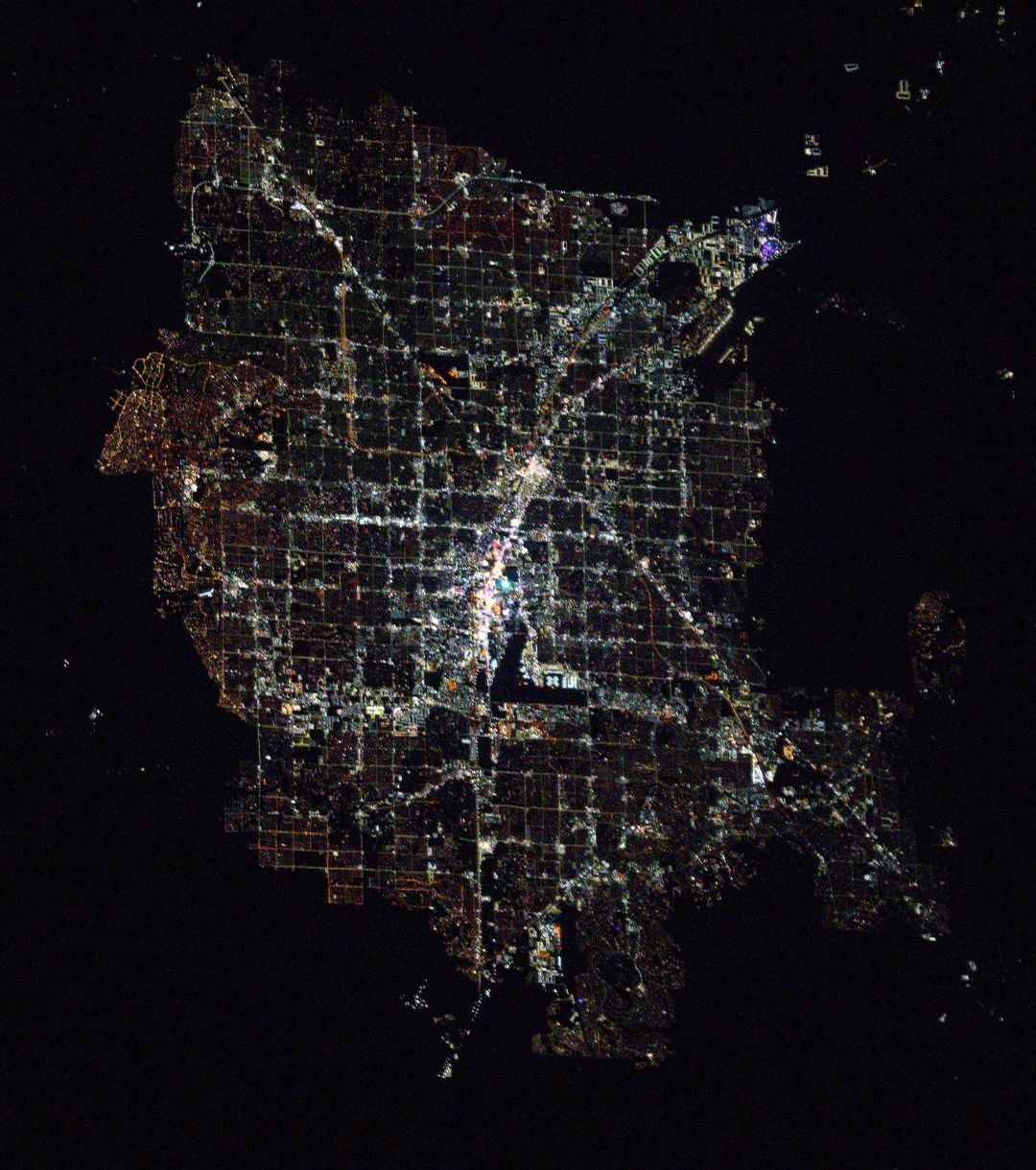 Las Vegas at night photographed from the International Space Station in May 2025, the Strip a bright line through the grid