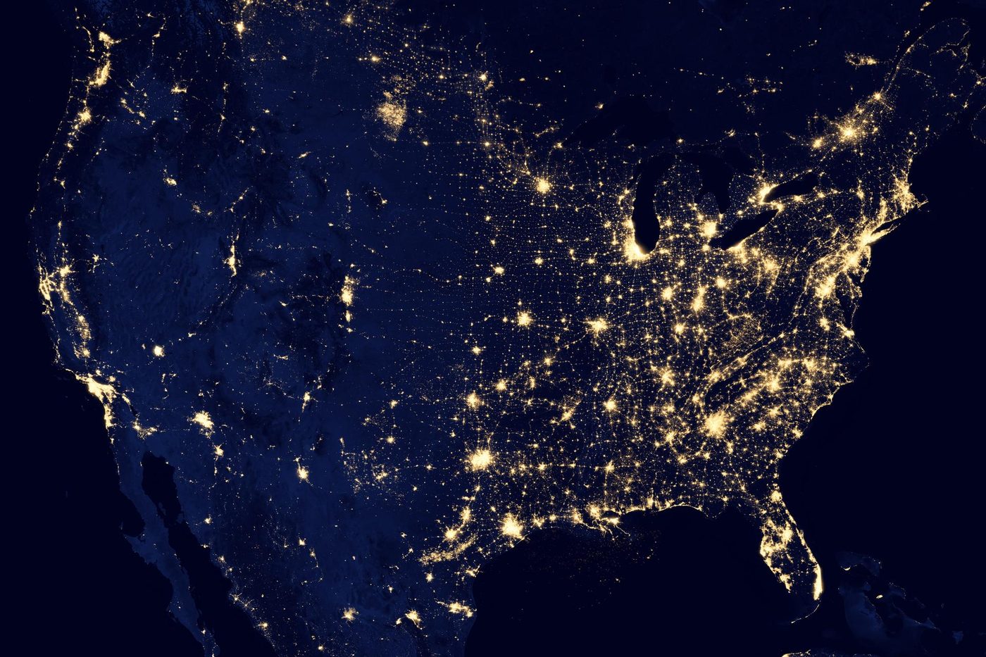 The United States at night from the Suomi NPP satellite, the cities glowing against the dark land between them