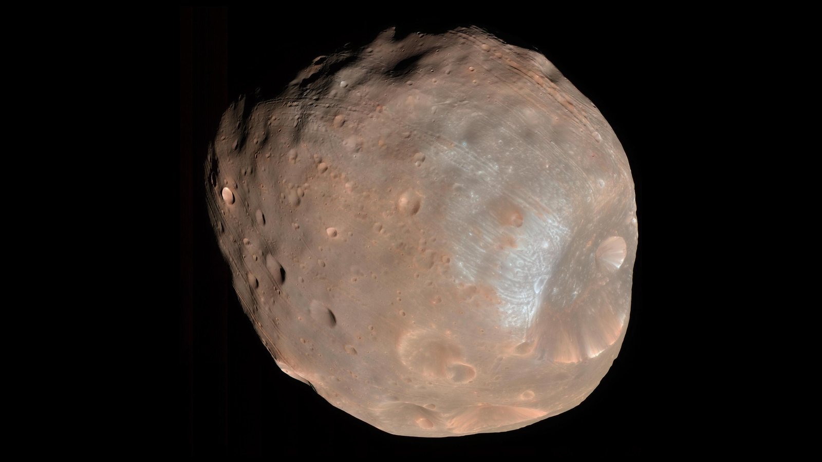 Mars's larger moon Phobos in colour, photographed by the HiRISE camera on NASA's Mars Reconnaissance Orbiter on March 23, 2008, with the large crater Stickney at right