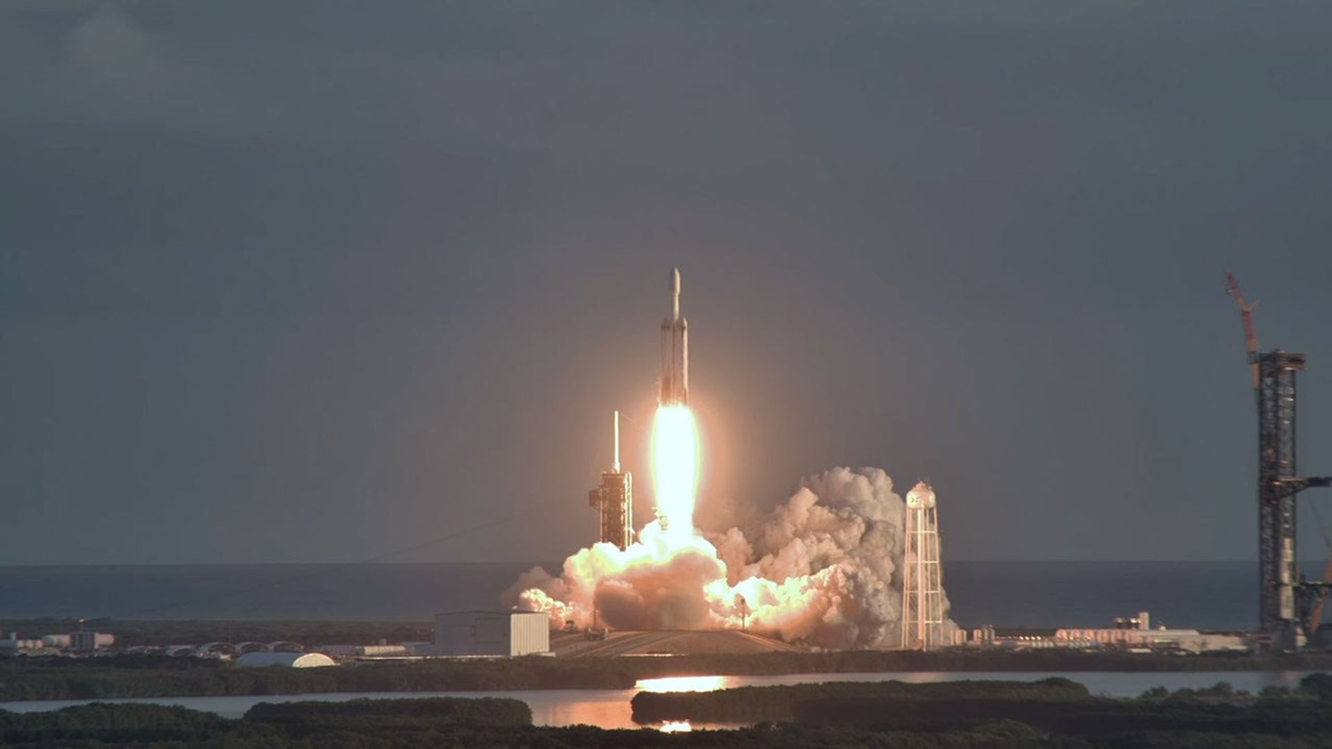 A SpaceX Falcon Heavy rocket carrying NASA's Roman Space Telescope seen transiting the Sun during launch from Launch Complex 39A on Aug. 30, 2026