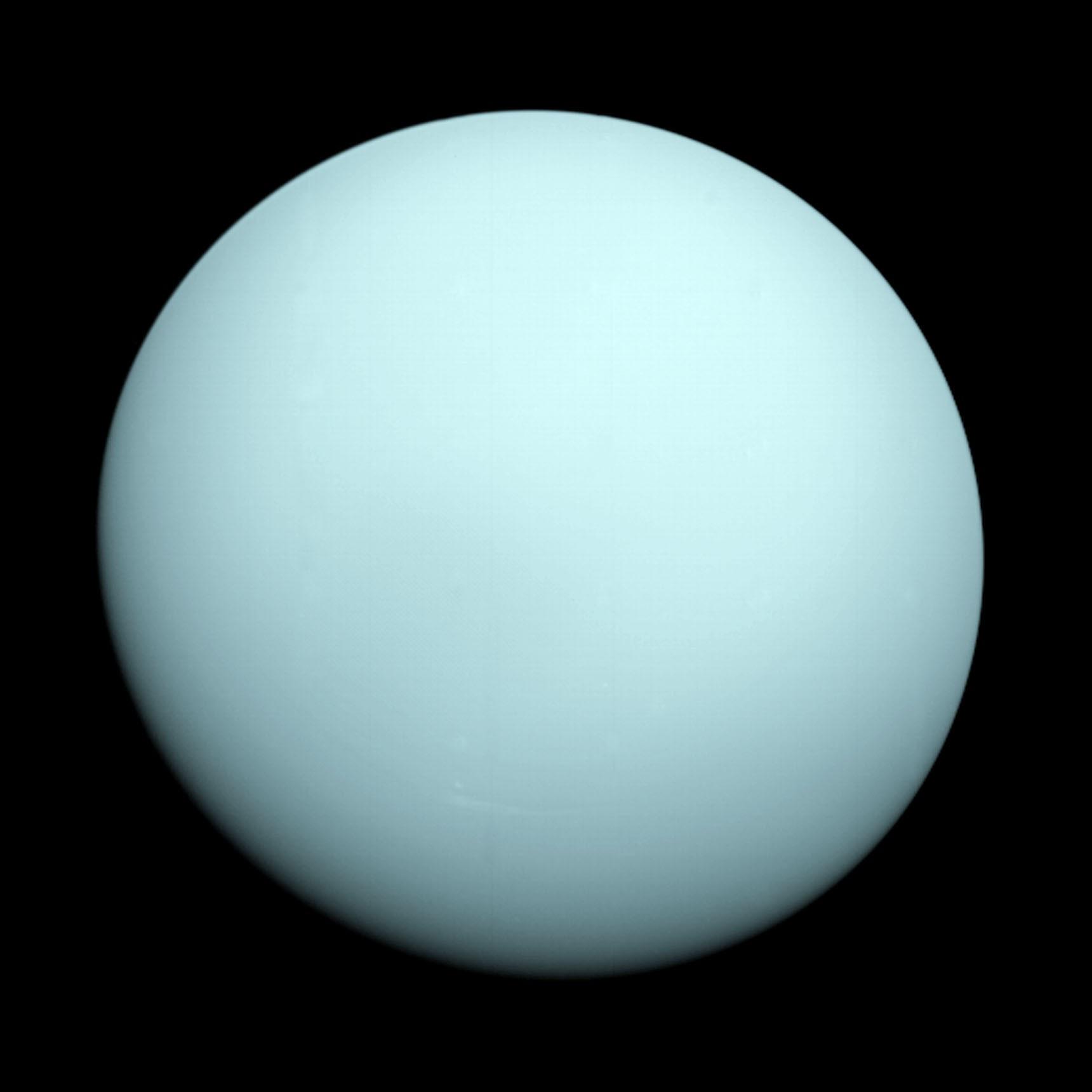 Uranus as seen by NASA Voyager 2 spacecraft in 1986 — full disk showing pale blue-green colour with no visible surface features