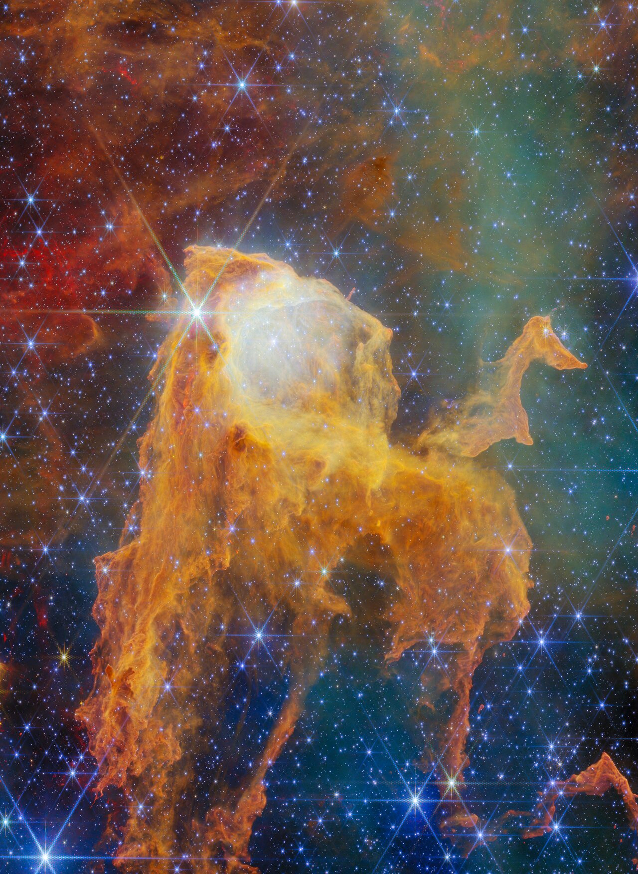 Webb NIRCam image of the Treasure Chest cometary globule in the Carina Nebula — a glowing chest-shaped cloud of gas and dust with bright stars spilling from its open lid, set against a field of dark orange globules and pale hazes